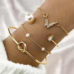 Waterproof 18K gold luxury butterfly bracelet stack Biya Accessoires UAE.