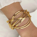 Waterproof 18K gold multi strand interwoven wire cuff bracelet Biya Accessoires UAE.