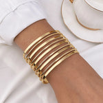 Waterproof 18K gold multi band wide cuff bracelet Biya Accessoires UAE.