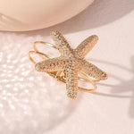Waterproof 18K gold starfish statement cuff Biya Accessoires UAE.