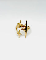 18K gold plated celestial starburst open ring by Biya Accessoires.