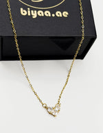 18K gold plated multi stone crystal heart necklace by Biya Accessoires.