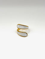 18K gold plated thick marbled white enamel bypass ring by Biya Accessoires.