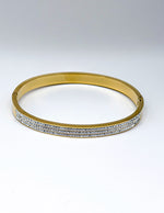 Hypoallergenic non-tarnish high polish gold rigid crystal bangle UAE.