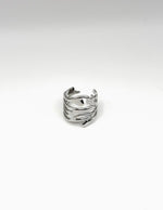 Waterproof silver molten cage adjustable ring for women Dubai.