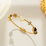 Hypoallergenic stainless steel gold bangle with crystals Dubai.