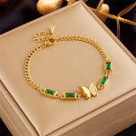 Waterproof gold frosted butterfly and green baguette charm bracelet UAE.