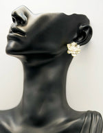 Close-up of premium hypoallergenic imitation jewelry featuring a 3D magnolia design.