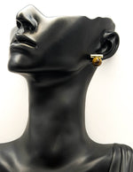 Biya Accessoires geometric gold bar and brown pearl stud earrings.