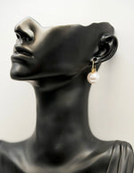 Best fashion jewelry in UAE minimalist pearl orb earrings for women.