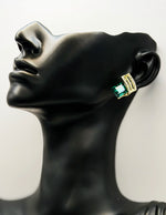 Everyday luxury fashion jewelry gold tone statement studs by Biya Accessoires Dubai.