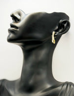 Best imitation jewellery brands in uae geometric open heart gold earrings with crystals.
