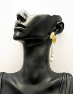 Everyday luxury jewelry uae botanical pearl dangles from best jewelry shop in UAE.
