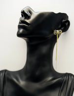 Biya Accessoires artificial jewellery online dubai crystal bow tassel drip earrings.