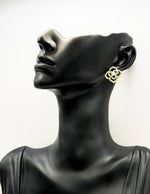 Best imitation jewellery brands in uae vintage-style black flower earrings with pearls.