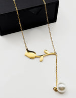 Waterproof non-tarnish artificial gold Y-drop floral necklace.