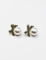 Close-up of premium hypoallergenic imitation jewelry featuring a crystal bow design.