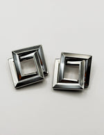 Best imitation jewellery brands in uae silver 3D diamond-shaped statement dangles.