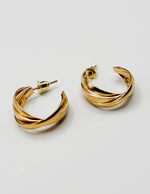 Best fashion jewelry in UAE bold gold hoop earrings for women.