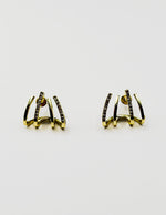 Biya Accessoires gold quad-claw crystal crawler earrings.