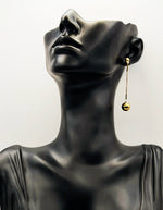 Close-up_of_premium_hypoallergenic_imitation_jewelry_featuring_a_liquid_snake_chain_design.