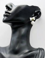 Everyday luxury jewelry uae coquette earrings by the best jewelry shop in UAE.