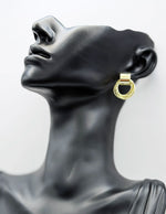 Close up of elegant imitation jewelry uae featuring gold plated fashion jewelry and textured rings.