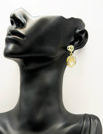 Elegant glowing stone and pavé crystal statement earrings for women.