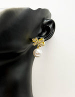 Everyday luxury fashion jewelry gold tone coquette drops by Biya Accessoires Dubai.