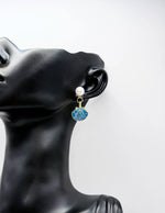 Best fashion jewelry in UAE azure blue shell earrings for women.