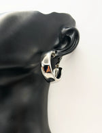 Biya Accessoires chunky silver hoop earrings with high-polish finish.