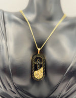 Close-up of premium hypoallergenic imitation jewelry with Greek key border and crystals.
