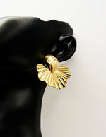 Best imitation jewellery brands in uae sculptural gold leaf earrings for women.