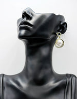 Best imitation jewellery brands in uae gold circle earrings with floating pearls and crystals.