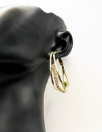 Best imitation jewellery brands in uae gold layered hoops with baguette stones.