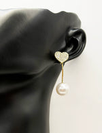 Best imitation jewellery brands in uae gold earrings with rhinestone hearts and pearls.
