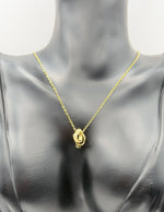 Gold eternity pendant necklace with cubic zirconia stones by Biya Accessoires.