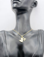 18K gold plated double heart pendant necklace with mother of pearl and crystals.