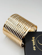 Hypoallergenic gold plated parallel band wide cuff United Arab Emirates.
