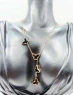 Waterproof gold Y-necklace with black carnelian butterflies Dubai.