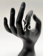 Waterproof silver sculptural wire adjustable ring for women Dubai.