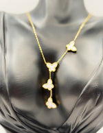 18K gold plated white butterfly lariat necklace by Biya Accessoires.