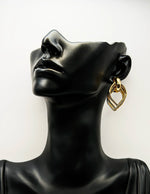 Imitation jewelry uae high-shine sculptural gold plated fashion jewelry.