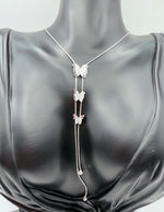 Waterproof non-tarnish silver butterfly Y-necklace resting in a luxury gift box for her