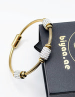 18K gold plated crystal pave station snake chain bracelet by Biya Accessoires.