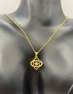 Modern luxury gold pavé abstract clover statement necklace gift for her.
