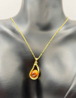 Hypoallergenic non-tarnish fluid gold geometric necklace.