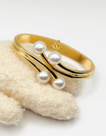 Waterproof 18K gold sweeping pearl cuff bracelet Biya Accessoires UAE.