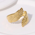 Modern luxury fine art editorial gold jewelry wrap wing ring gift for her.