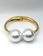Non-tarnish double pearl statement cuff for women Dubai luxury fashion.